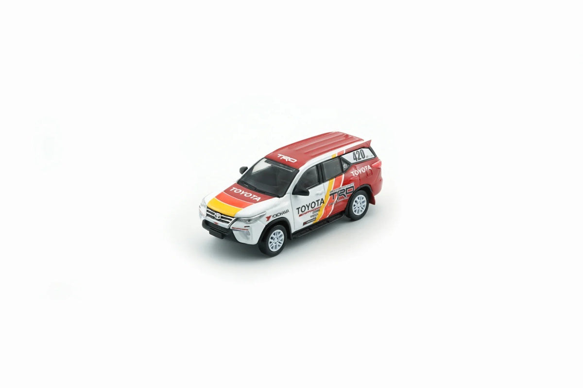 Front three-quarter view of Toyota Fortuner 2018 TRD Racing 1:64 diecast model car by BM Creations in white and red #420 livery (64B0474)