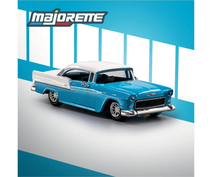 Model of a blue classic car with white top on a blue and gray background, featuring the Majorette brand.