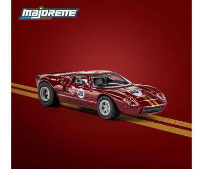 Model car on a red background with 'Majorette' branding.