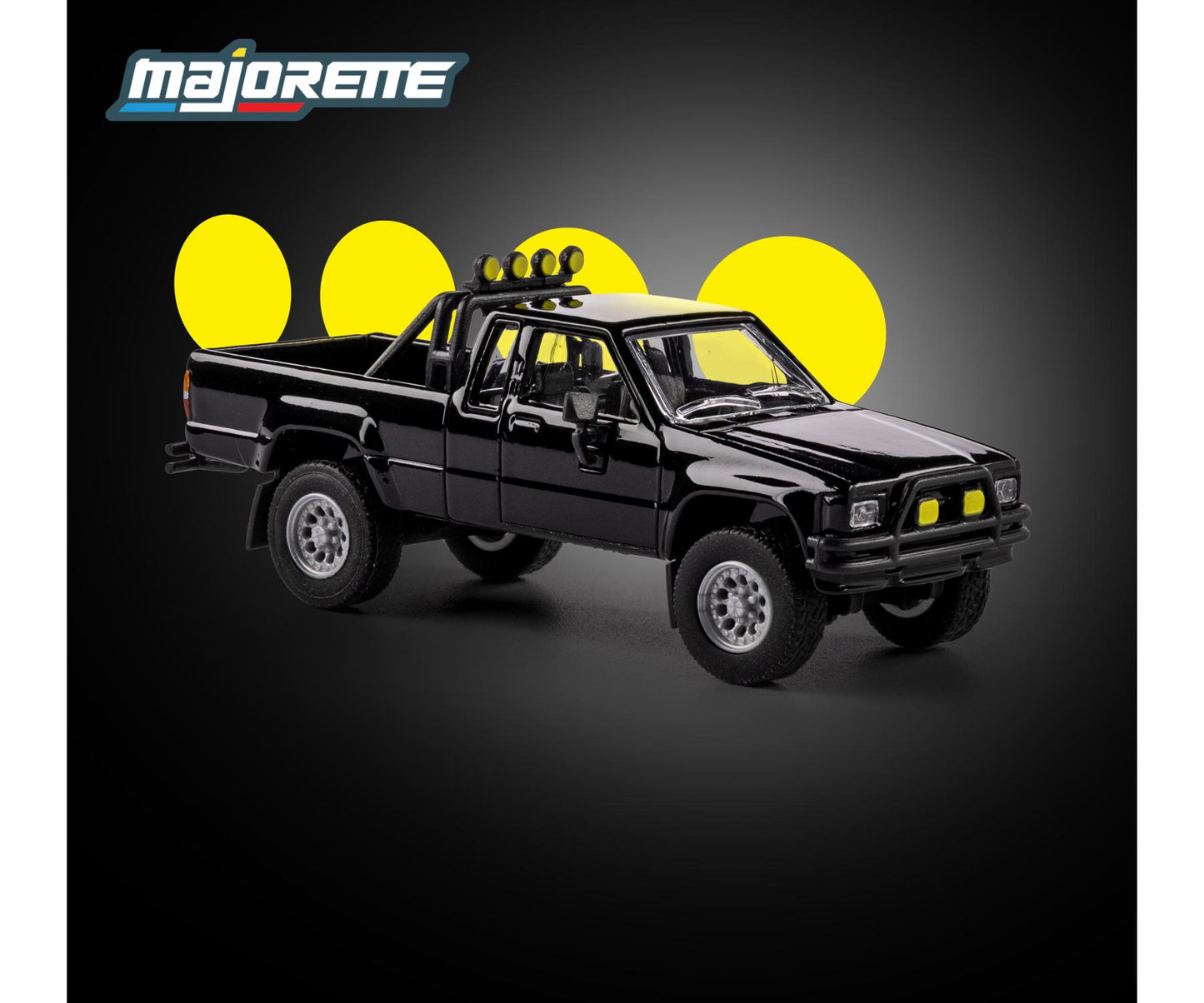front perspective view of 1985 Toyota Hilux SR5 Pickup Black 1:64 Scale Model Car – Majorette Premium (Product Code: 8505001016)