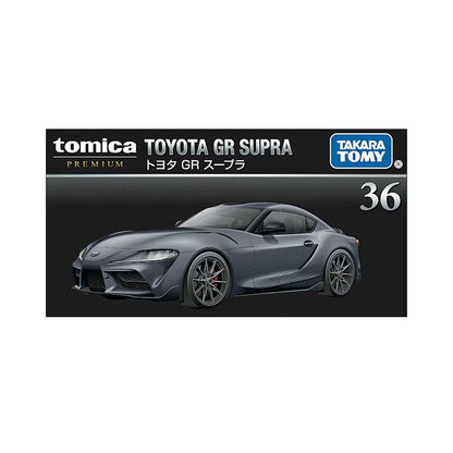 Model car packaging for Toyota GR Supra by Takara Tomy on a white background