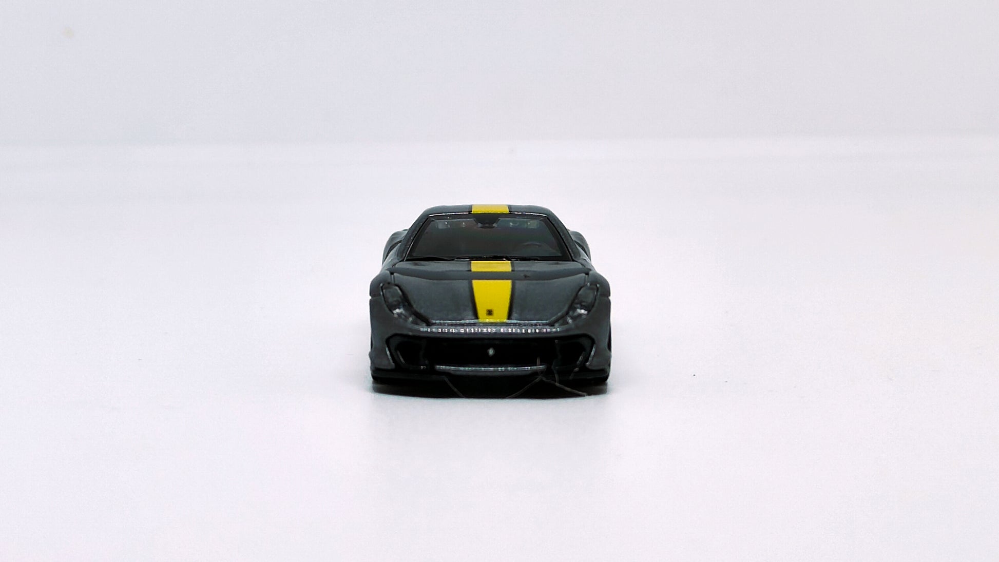 Front perspective view Ferrari 812 Competizione Grey 1:64 scale model car - Bburago