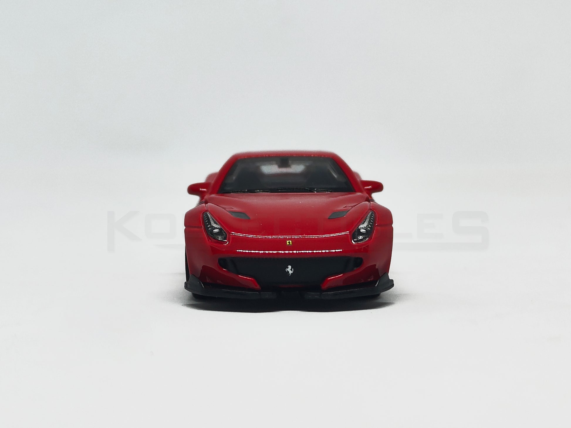 front view of F12DTF Red 1:64 scale model car 1:64 scale model car - Bburago