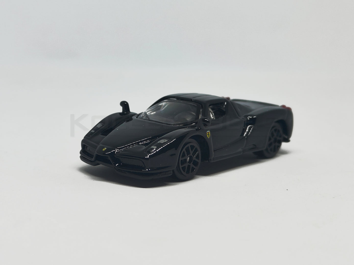 Enzo Ferrari Black 1:64 scale model car - Bburago