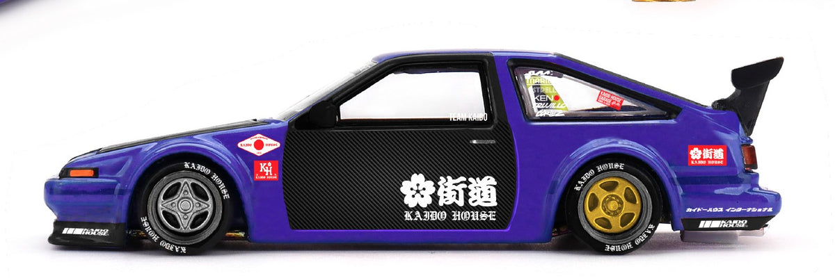 Kaido House x Mini GT Toyota AE86 Sprinter Trueno Kaido Touge V1 purple and black 1:64 scale diecast model car, side profile showing the staggered silver front and gold rear wheels