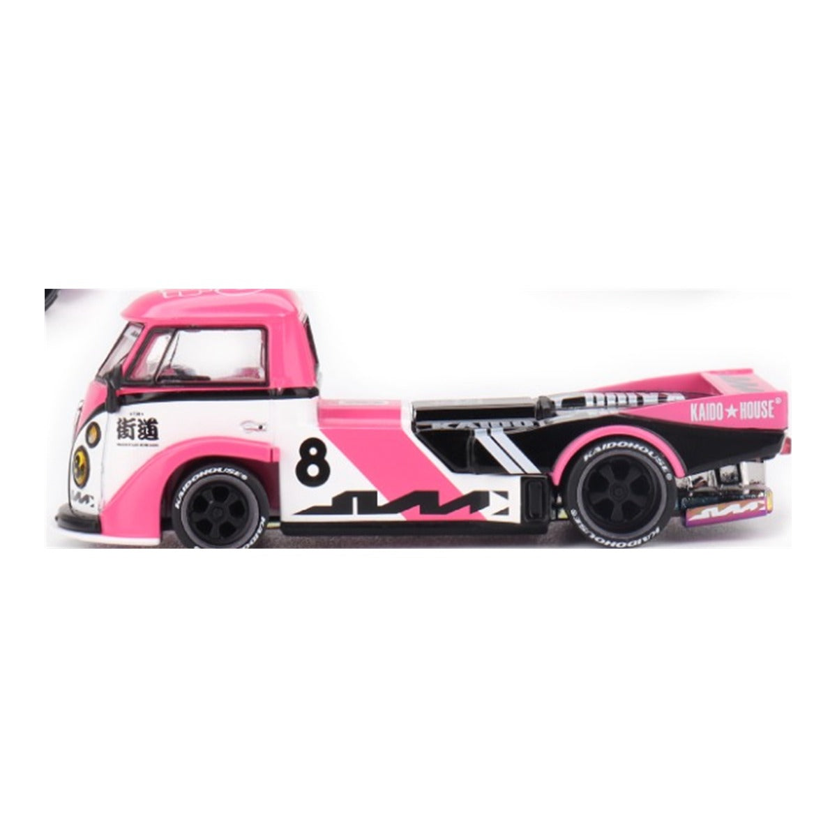 Kaido House x Mini GT Volkswagen T1 Kaido Rad Van V1 pink 1:64 scale diecast model car, side profile showing the long flat deck and lettered tires