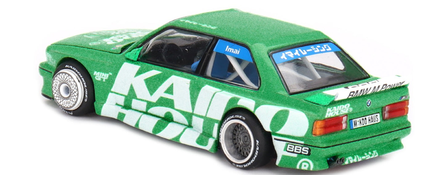 Rear view of BMW M3 E30 Kaido Works V2 1:64 diecast showing rear wing, widebody fenders and Kaido House graphics (KHMG0242)