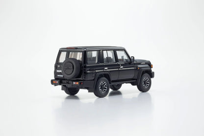 Rear three-quarter view of Toyota Land Cruiser 70 Attitude Black Mica 1:43 diecast showing the tailgate-mounted spare wheel and rear lights (03928BK)