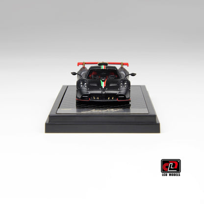 Rear view of Pagani Imola 1:64 diecast showing the red multi-element rear wing on gold uprights and quad exhausts (LCD64041-MBCI)