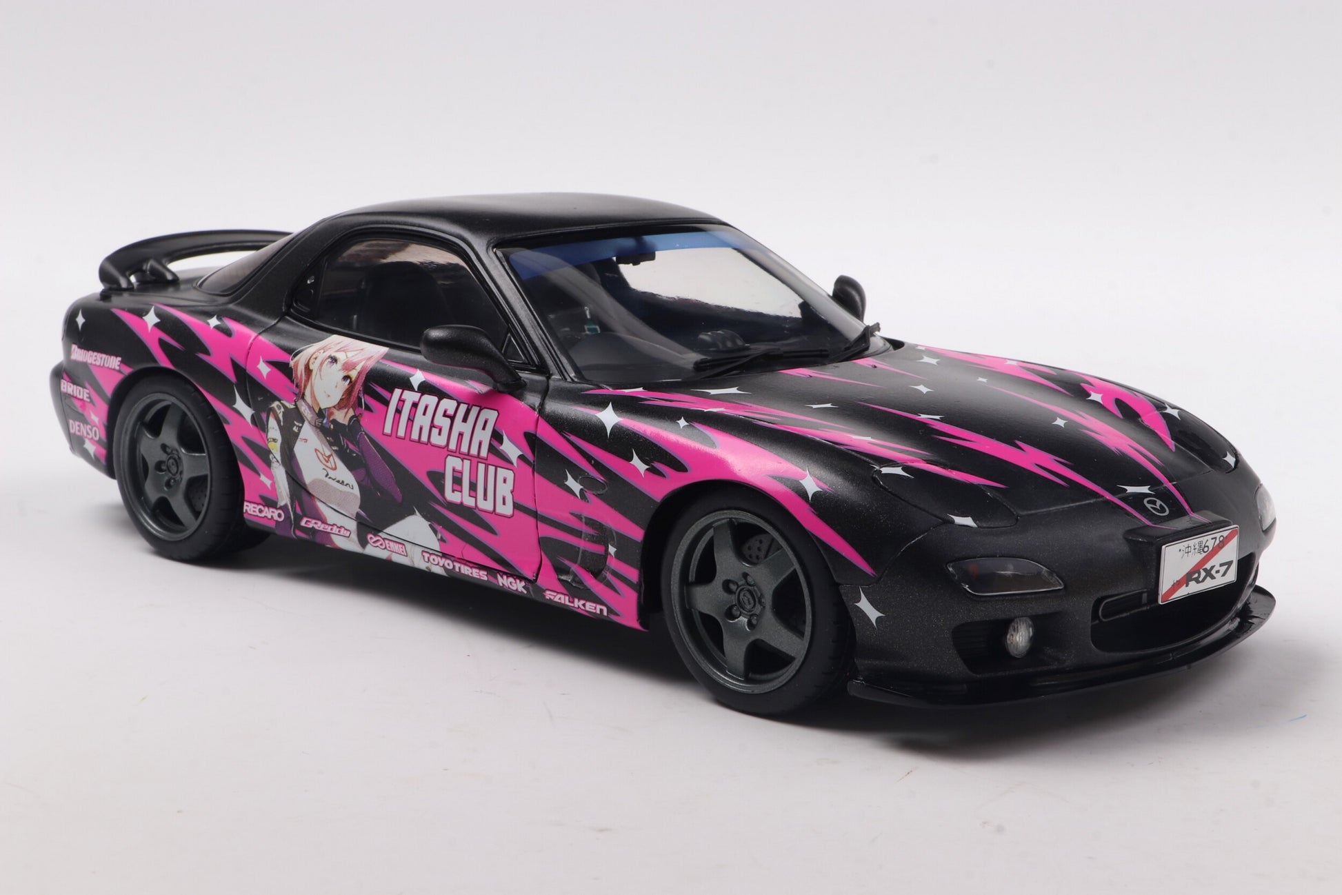 Second front perspective view of Mazda RX7 FD3RS Solido works Itasha Club Pink 1999 1:18 scale model car - Solido