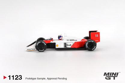Side profile of McLaren MP4/4 #11 Alain Prost 1988 Japanese Grand Prix 1:64 scale model car with Goodyear Eagle tyres (MGT01123)