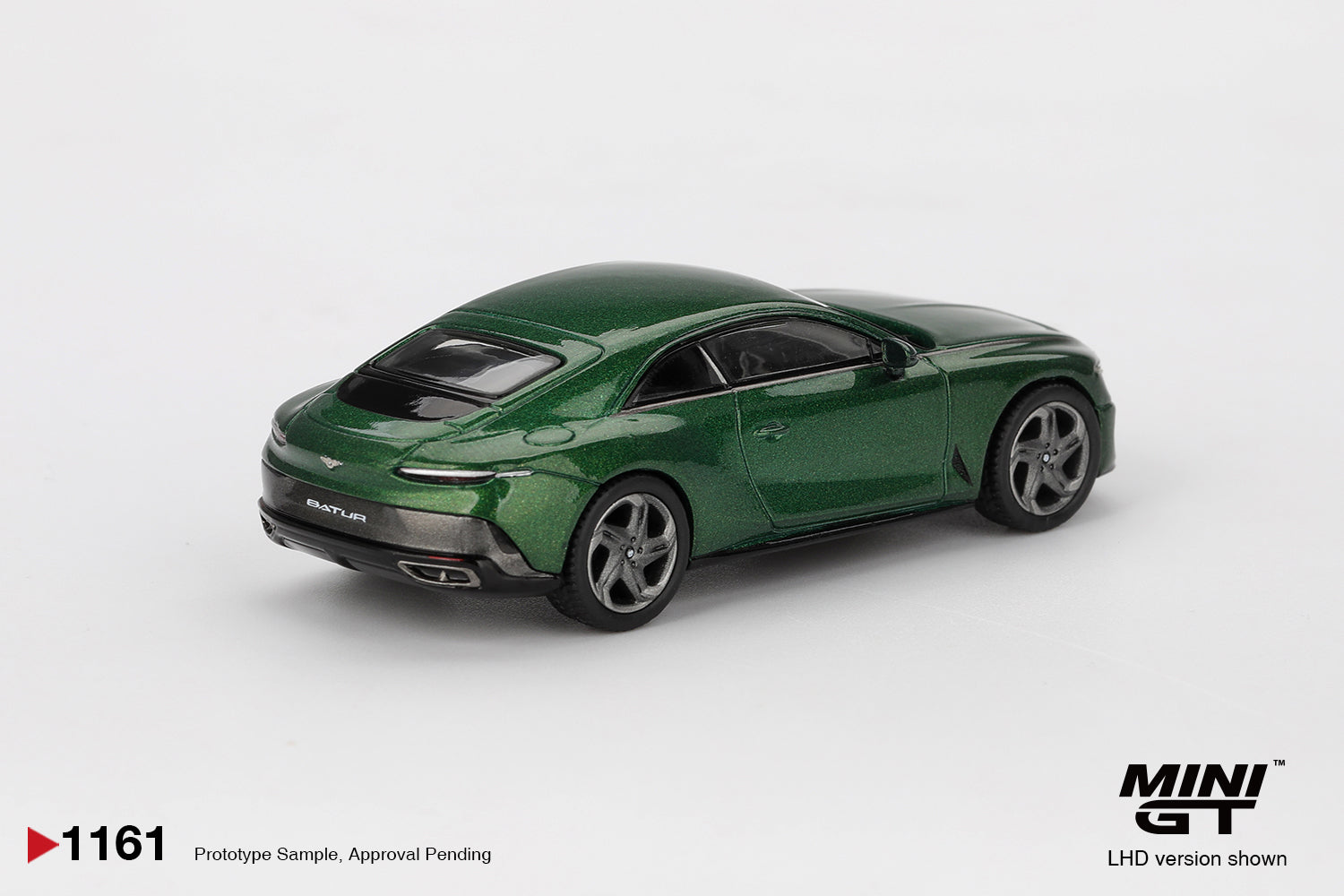 Rear view of Bentley Batur Scarab Green 1:64 diecast showing the rear haunches and quad exhausts (MGT01161)