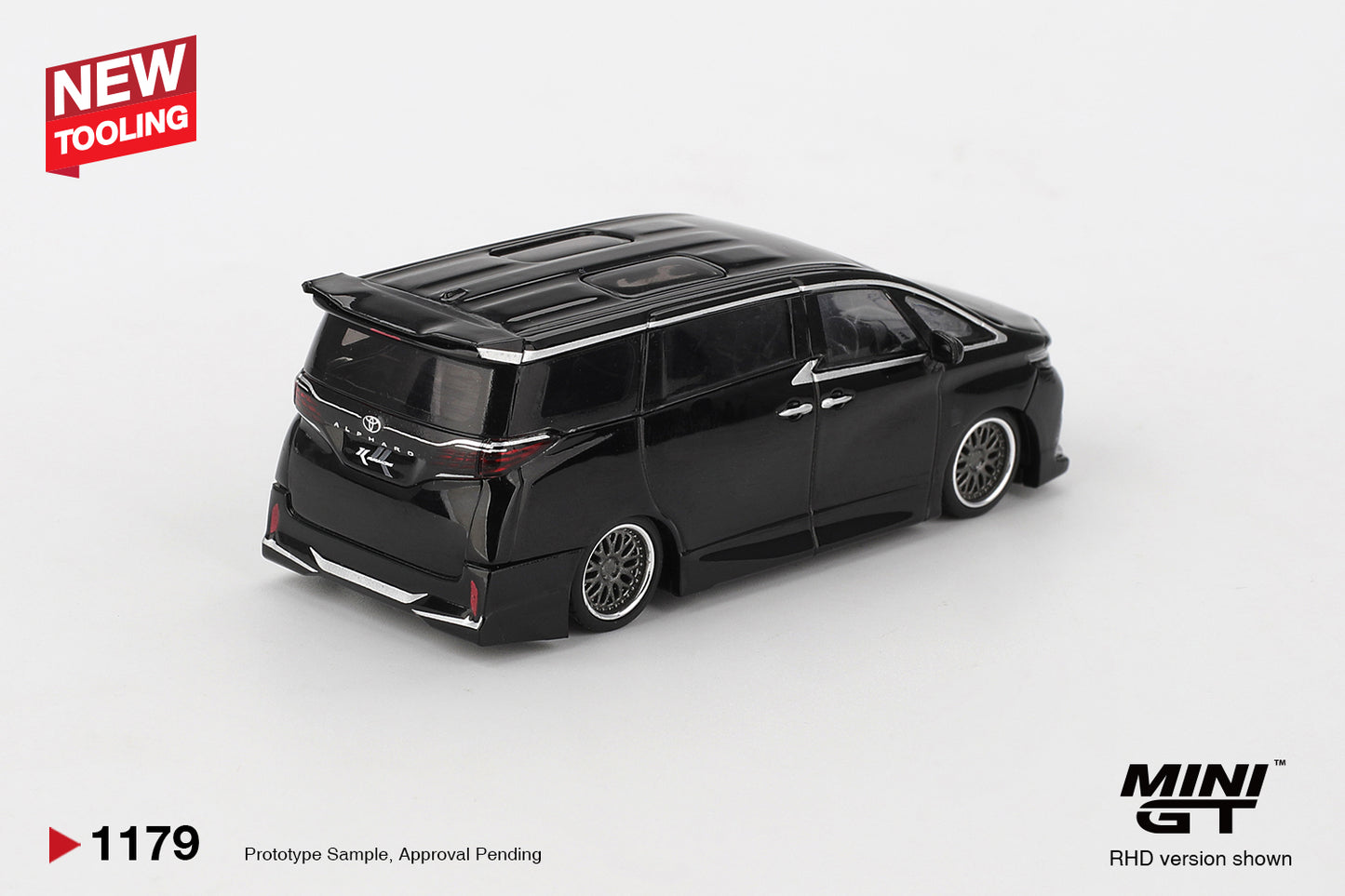 Rear view of Toyota Alphard 40 KUHL black 1:64 diecast showing the roof spoiler and rear lights (MGT01179)