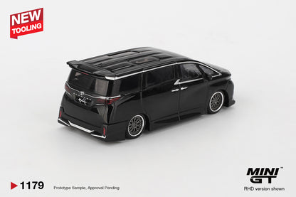 Rear view of Toyota Alphard 40 KUHL black 1:64 diecast showing the roof spoiler and rear lights (MGT01179)