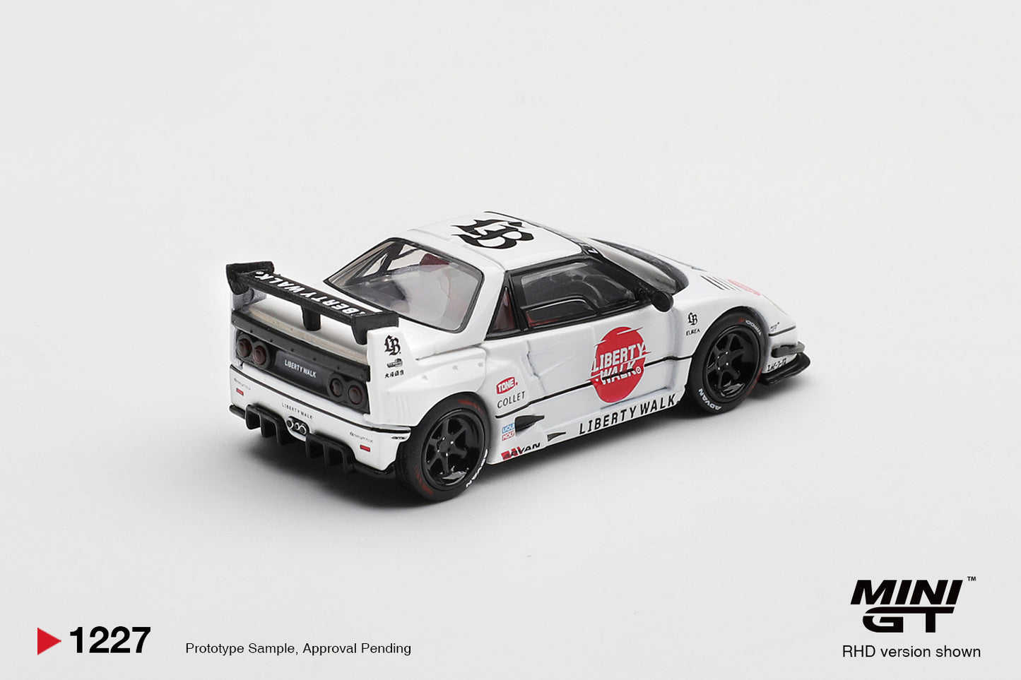 Rear view of Mazda AZ-1 Liberty Walk LB40 LB-Hinomaru 1:64 diecast showing the black GT wing and rear diffuser (MGT01227)