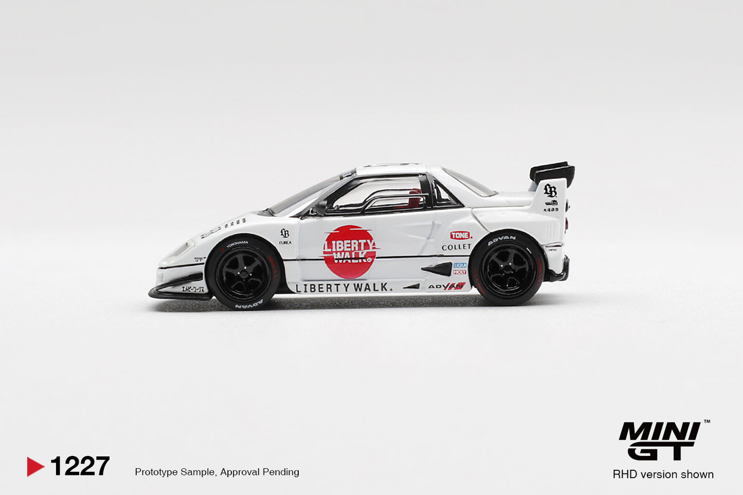 Side profile of Mazda AZ-1 Liberty Walk LB40 LB-Hinomaru 1:64 scale model car with red Hinomaru roundel and black ADVAN wheels (MGT01227)