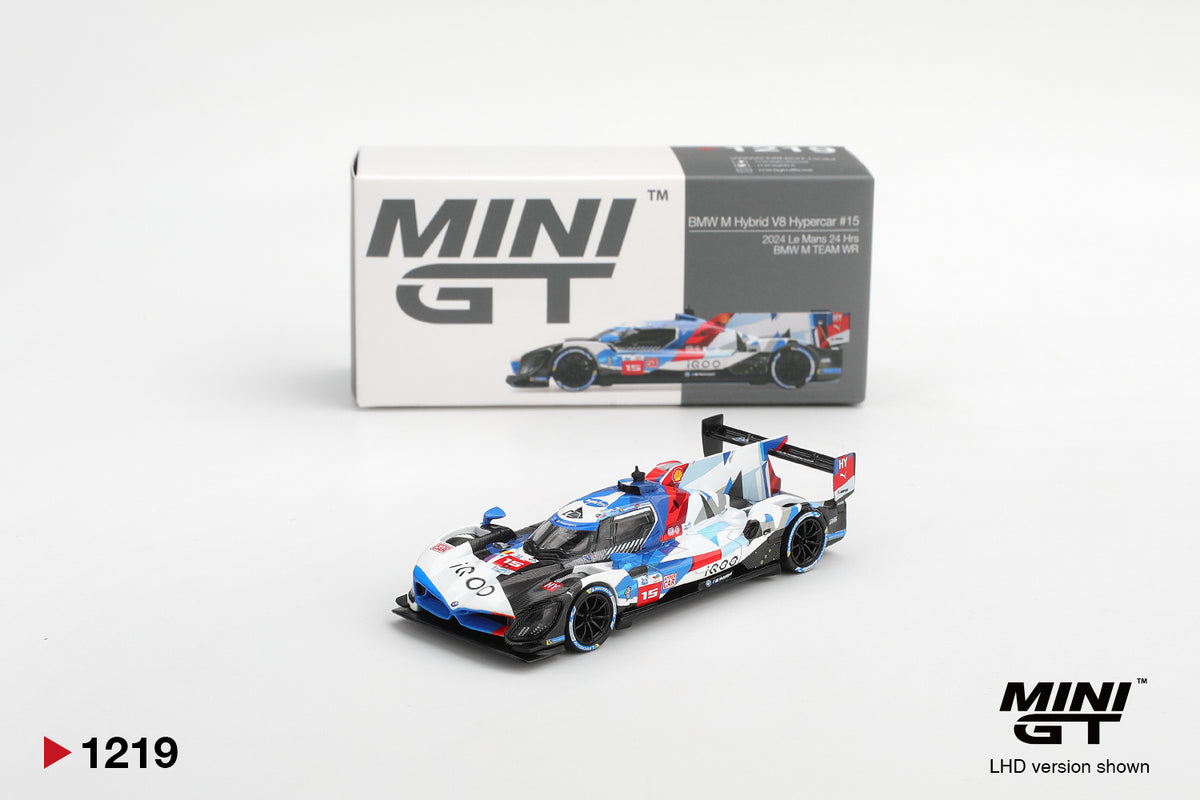 Mini GT BMW M Hybrid V8 Hypercar #15 BMW M Team WRT 2024 Le Mans 24 Hrs 1:64 scale diecast model car shown with its Mini GT collector box