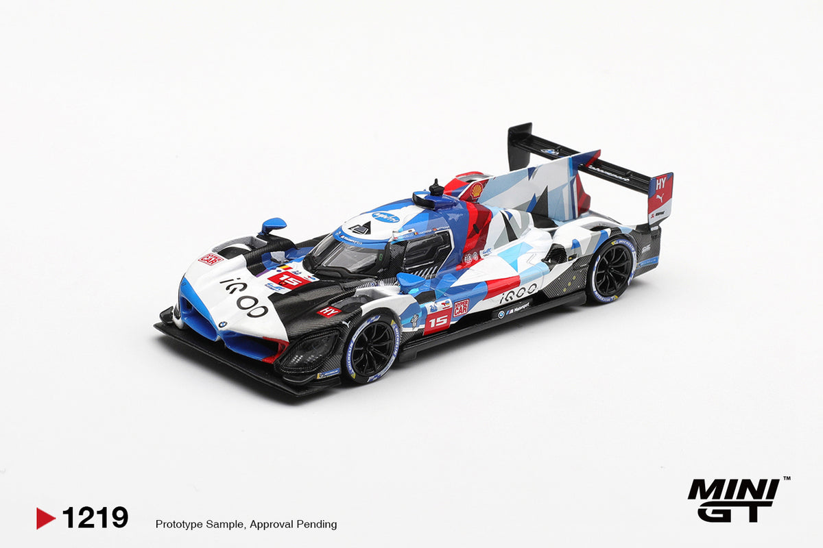 Mini GT BMW M Hybrid V8 Hypercar #15 white and blue 1:64 scale diecast model car, front three-quarter view showing the iQOO nose and BMW kidney intakes