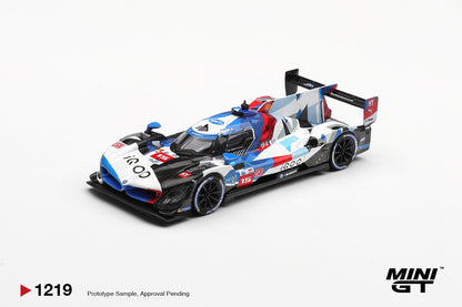 Mini GT BMW M Hybrid V8 Hypercar #15 white and blue 1:64 scale diecast model car, front three-quarter view showing the iQOO nose and BMW kidney intakes