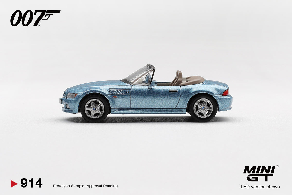 Mini GT BMW Z3 GoldenEye 007 Atlanta Blue 1:64 scale diecast model car, side profile showing the long-bonnet roadster stance and chrome five-spoke wheels