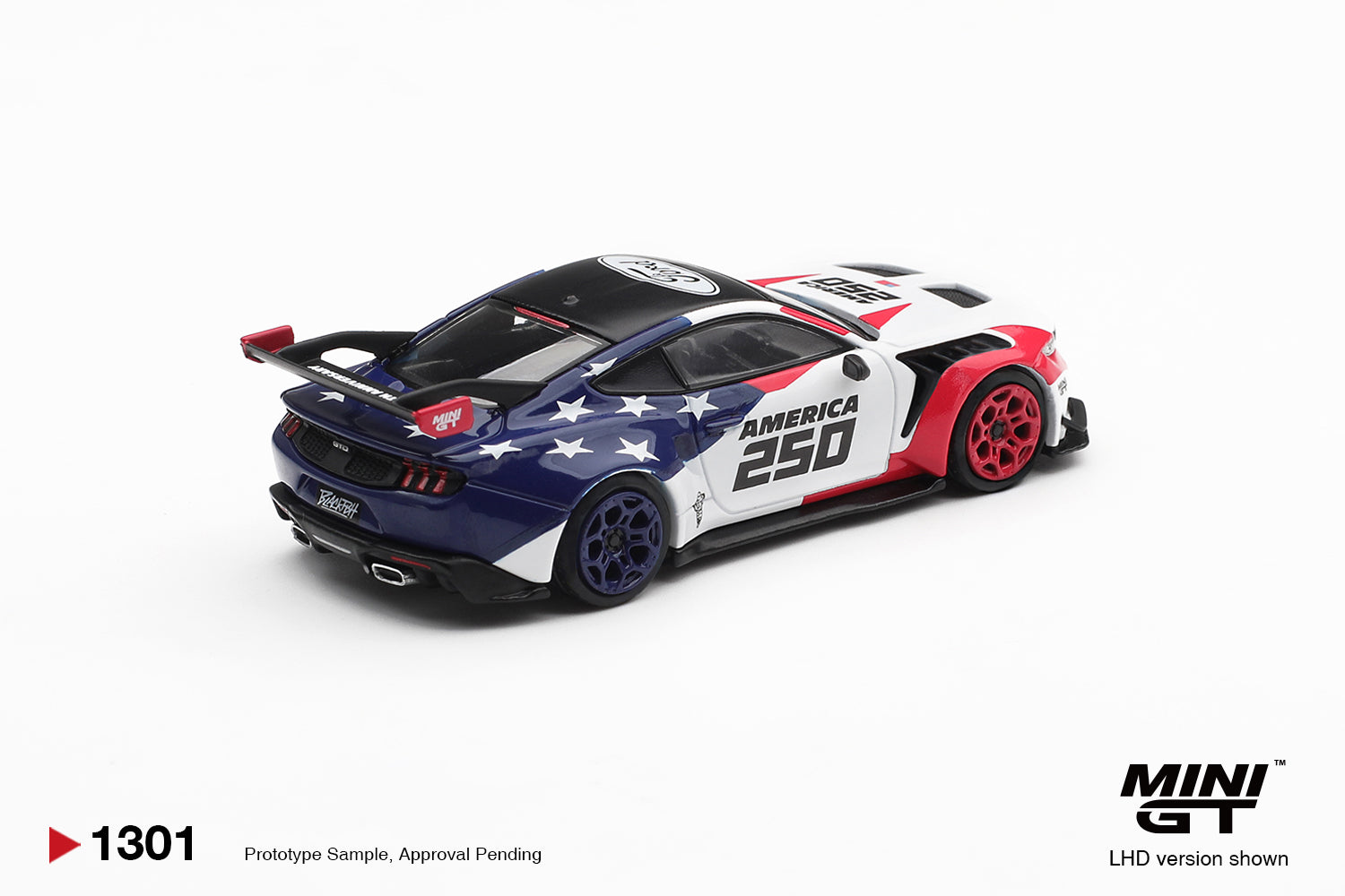 Mini GT Ford Mustang GTD America 250 USA Exclusive white red blue 1:64 scale diecast model car, rear three-quarter view showing the star-field rear quarter and swan-neck wing