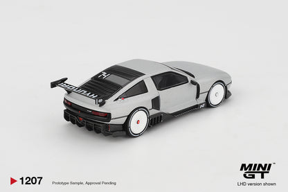 Mini GT Hyundai Concept N Vision 74 (VP2) silver 1:64 scale diecast model car, rear three-quarter view showing the tall HYUNDAI rear wing and 74 roof graphic