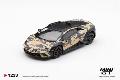 Mini GT Lamborghini Huracan Sterrato desert tan camouflage 1:64 scale diecast model car from the All-Terrain set, front three-quarter view showing the black hood and off-road wheels