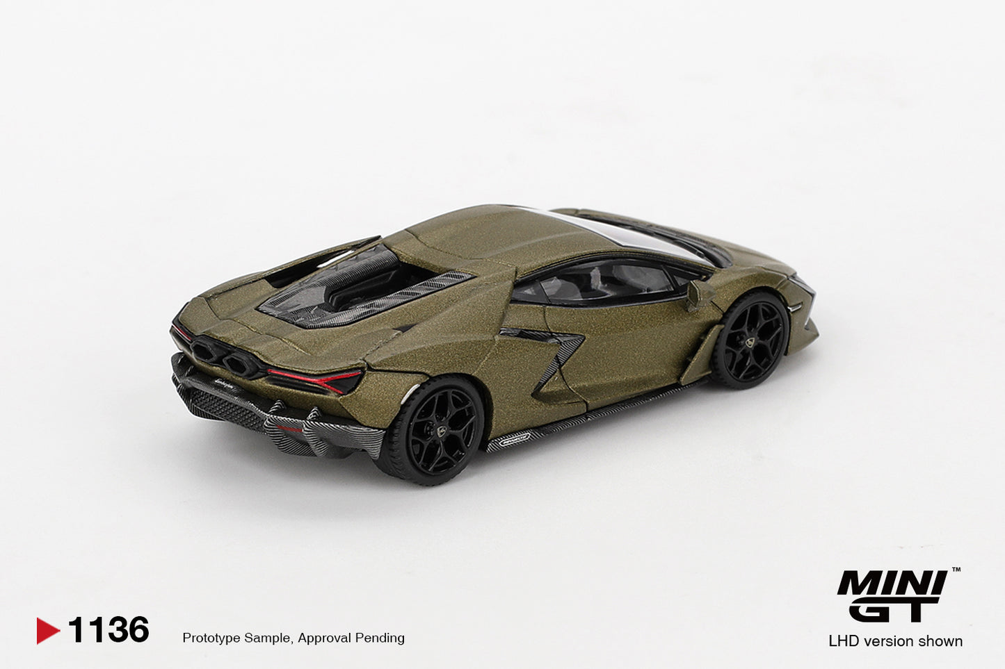 Rear three-quarter view of Lamborghini Revuelto Verde Gea Matte 1:64 diecast showing the hexagonal exhausts and carbon rear diffuser (MGT01136)