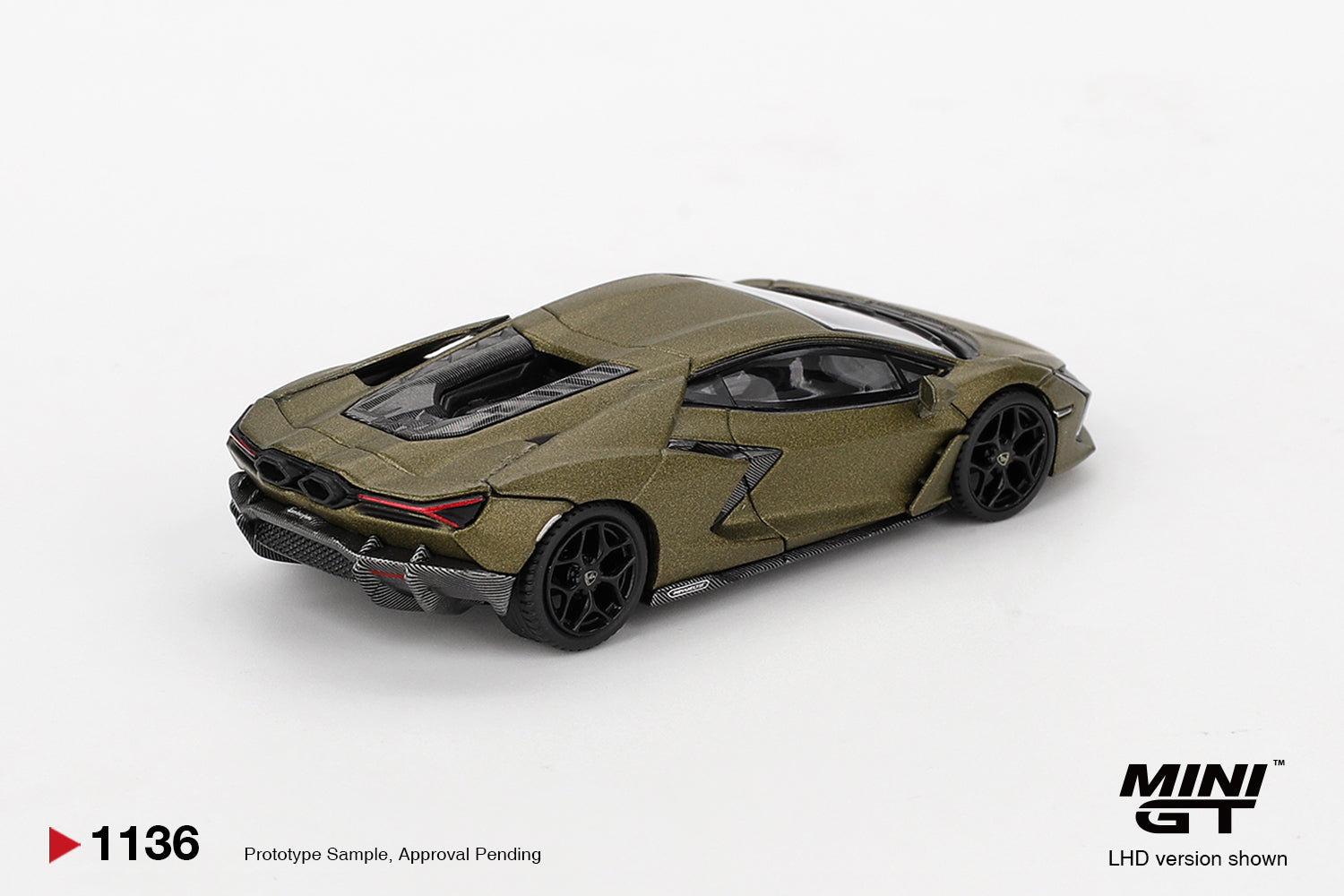 Rear three-quarter view of Lamborghini Revuelto Verde Gea Matte 1:64 diecast showing the hexagonal exhausts and carbon rear diffuser (MGT01136)