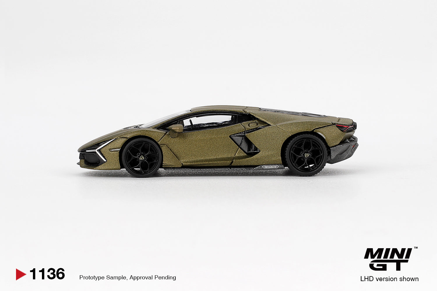 Side profile of Lamborghini Revuelto Verde Gea Matte 1:64 scale model car showing the low mid-engine stance and black multi-spoke wheels (MGT01136)