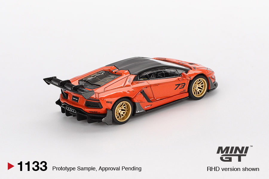 Rear three-quarter view of LB★WORKS Lamborghini Aventador orange 1:64 diecast by Mini GT showing the swan-neck GT wing and carbon engine cover (MGT01133)