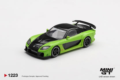 Front three-quarter view of Mazda RX-7 VeilSide Fortune7 Green 1:64 diecast model car by Mini GT showing the widebody nose and black bonnet (MGT01223)