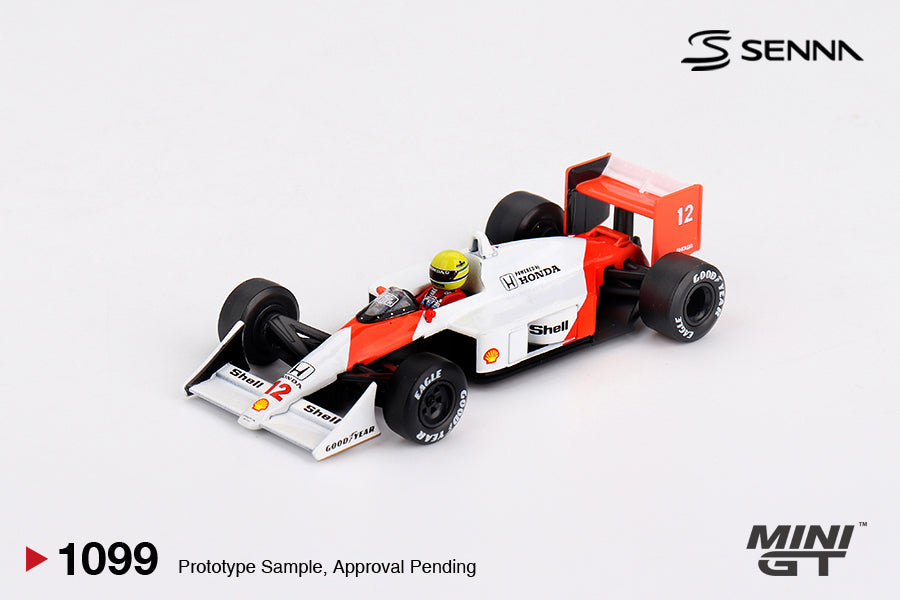Mini GT McLaren MP4/4 #12 Ayrton Senna 1988 Japanese Grand Prix Winner white and red 1:64 scale diecast model car, raised front three-quarter view showing the cockpit with the Senna driver figure and the Honda airbox