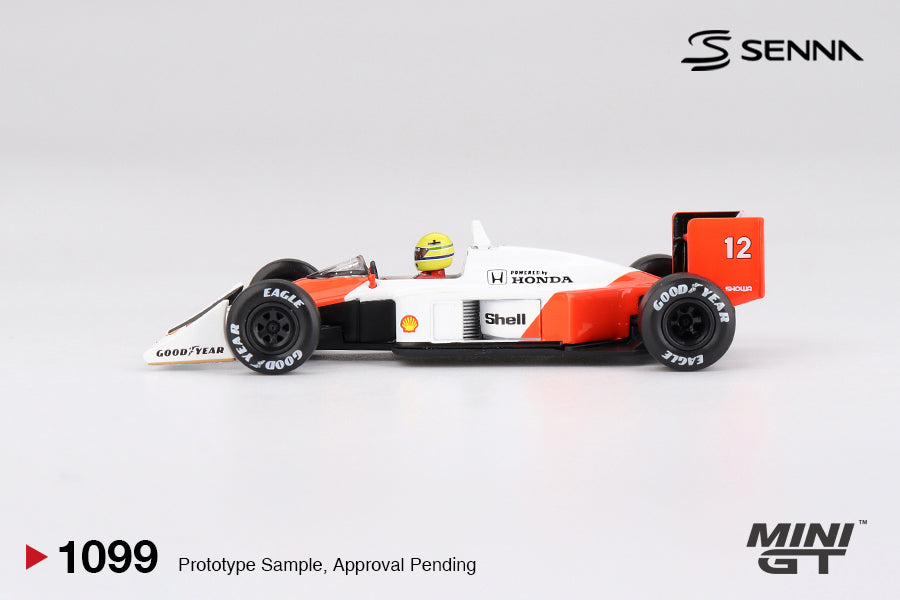 Mini GT McLaren MP4/4 #12 Ayrton Senna 1988 Japanese Grand Prix Winner white and red 1:64 scale diecast model car, side profile showing the Goodyear Eagle slicks and rear wing