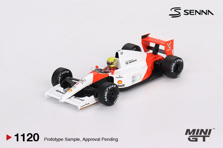 Mini GT McLaren MP4/6 #1 Ayrton Senna 1991 Japanese Grand Prix 1:64 scale diecast model car, front three-quarter view showing the red and white nose and Senna's yellow helmet