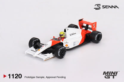 Mini GT McLaren MP4/6 #1 Ayrton Senna 1991 Japanese Grand Prix 1:64 scale diecast model car, front three-quarter view showing the red and white nose and Senna's yellow helmet