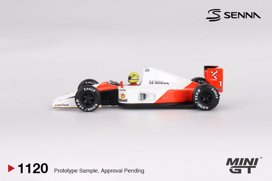 Mini GT McLaren MP4/6 #1 Ayrton Senna 1991 1:64 scale diecast model car, side profile showing Honda and Shell logos and Goodyear tires