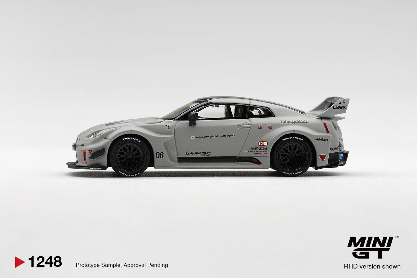 Side profile of Nissan LB-Silhouette WORKS GT 35GT-RR Ver.1 matt grey 1:64 scale model car showing the riveted widebody arches (MGT01248)