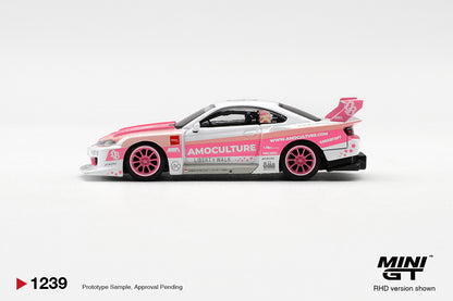 Mini GT Nissan Silvia S15 LB-Super Silhouette AMOCULTURE pink and white 1:64 scale diecast model car, side profile showing the AMOCULTURE sill lettering and pink multi-spoke wheels