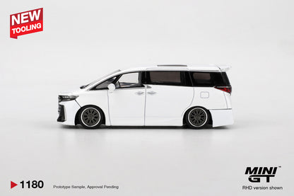 Side view of Toyota Vellfire 40 KUHL White 1:64 scale model car showing the slammed stance and dark multi-spoke wheels (MGT01180)