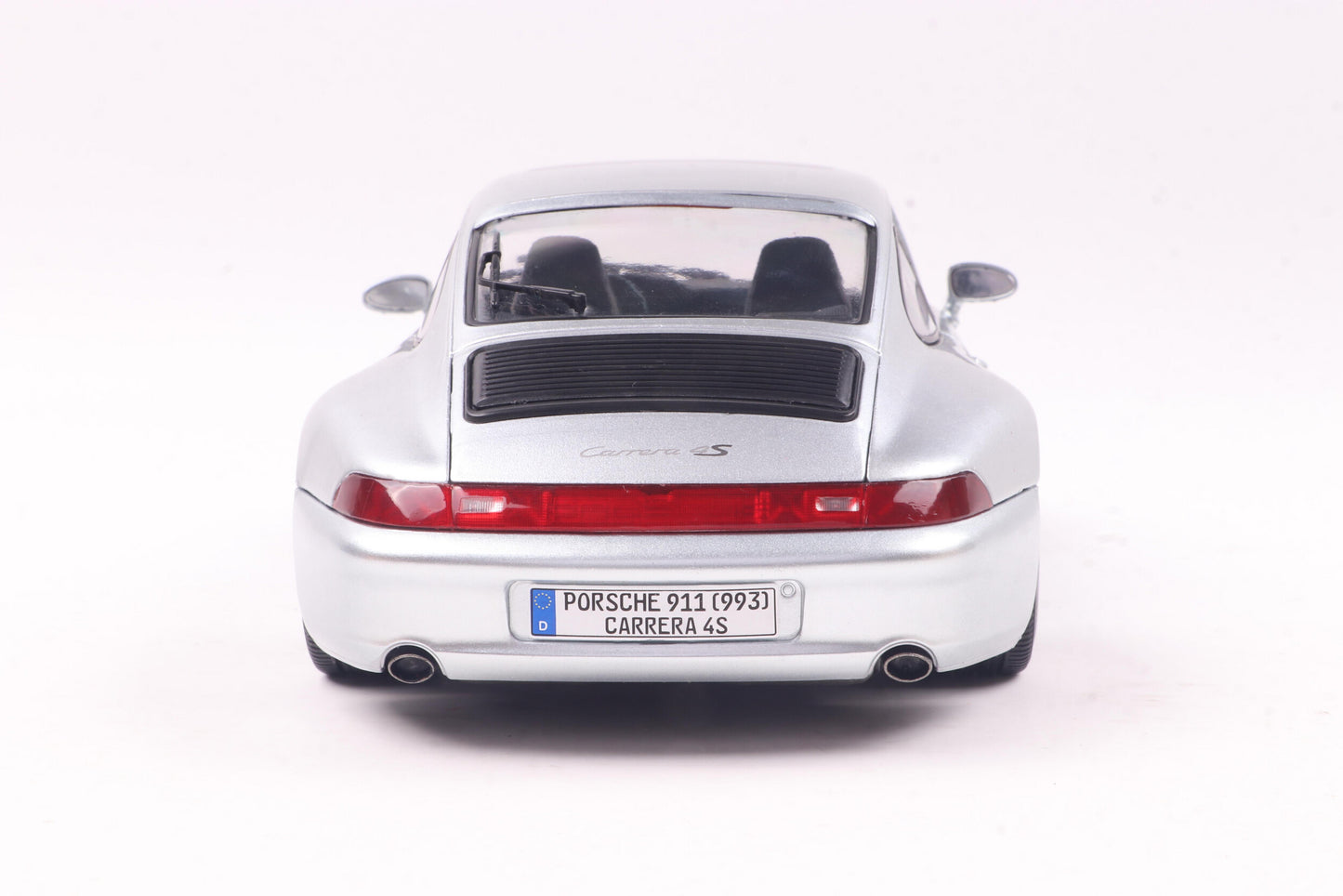 Back view of Porsche 911 (993) 4S Polar Silver 1996 1:18 scale model car - Solido