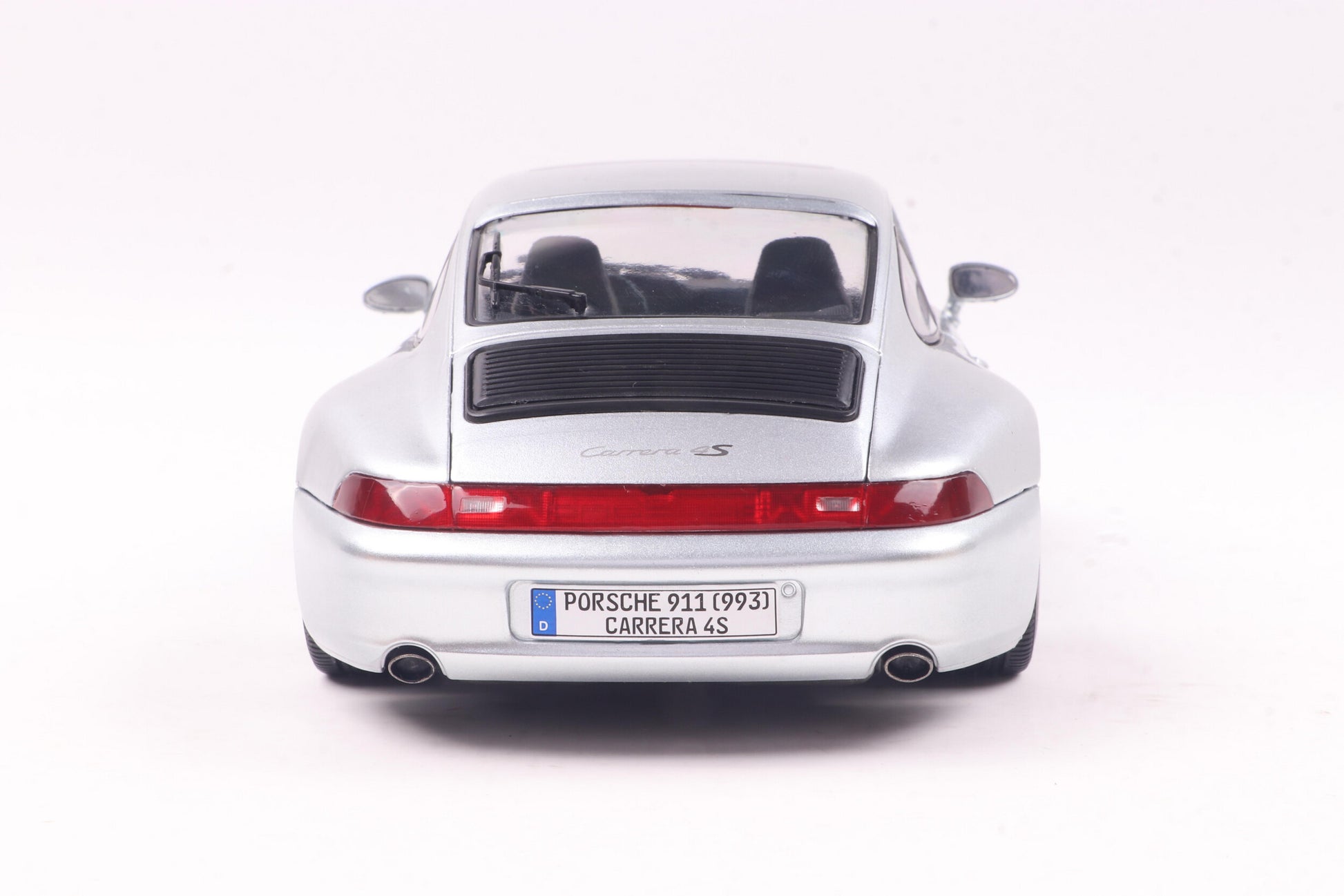 Back view of Porsche 911 (993) 4S Polar Silver 1996 1:18 scale model car - Solido