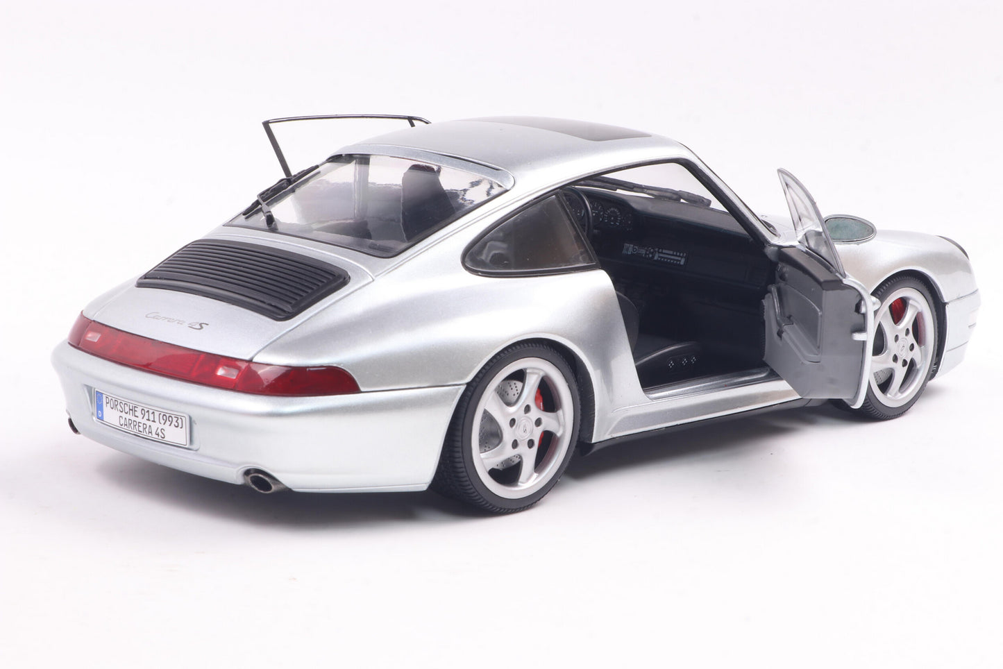 Back2 perspective view with doors open Porsche 911 (993) 4S Polar Silver 1996 1:18 scale model car - Solido