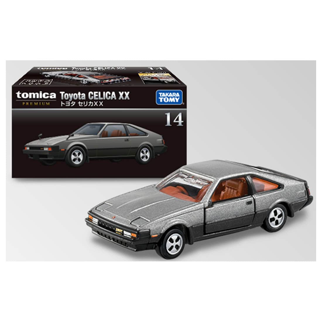 Front perspective view of Toyota Celica XX Silver 1:64 with box scale model car - Tomica premium