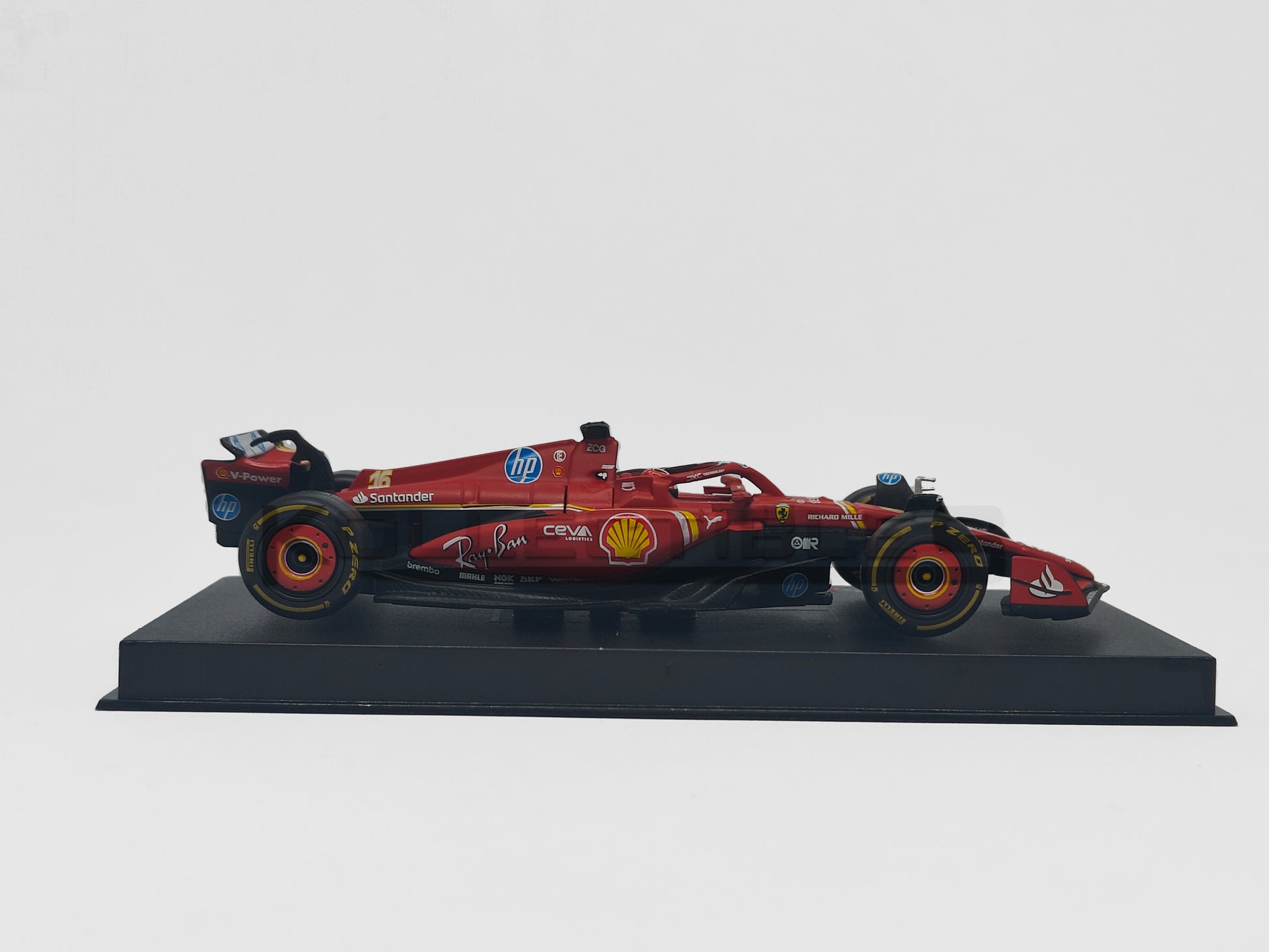 side viw of Ferrari SF-24 Formula 1 Charles Leclerc 2024 1:43 scale model car with Acrylic case - Bburago