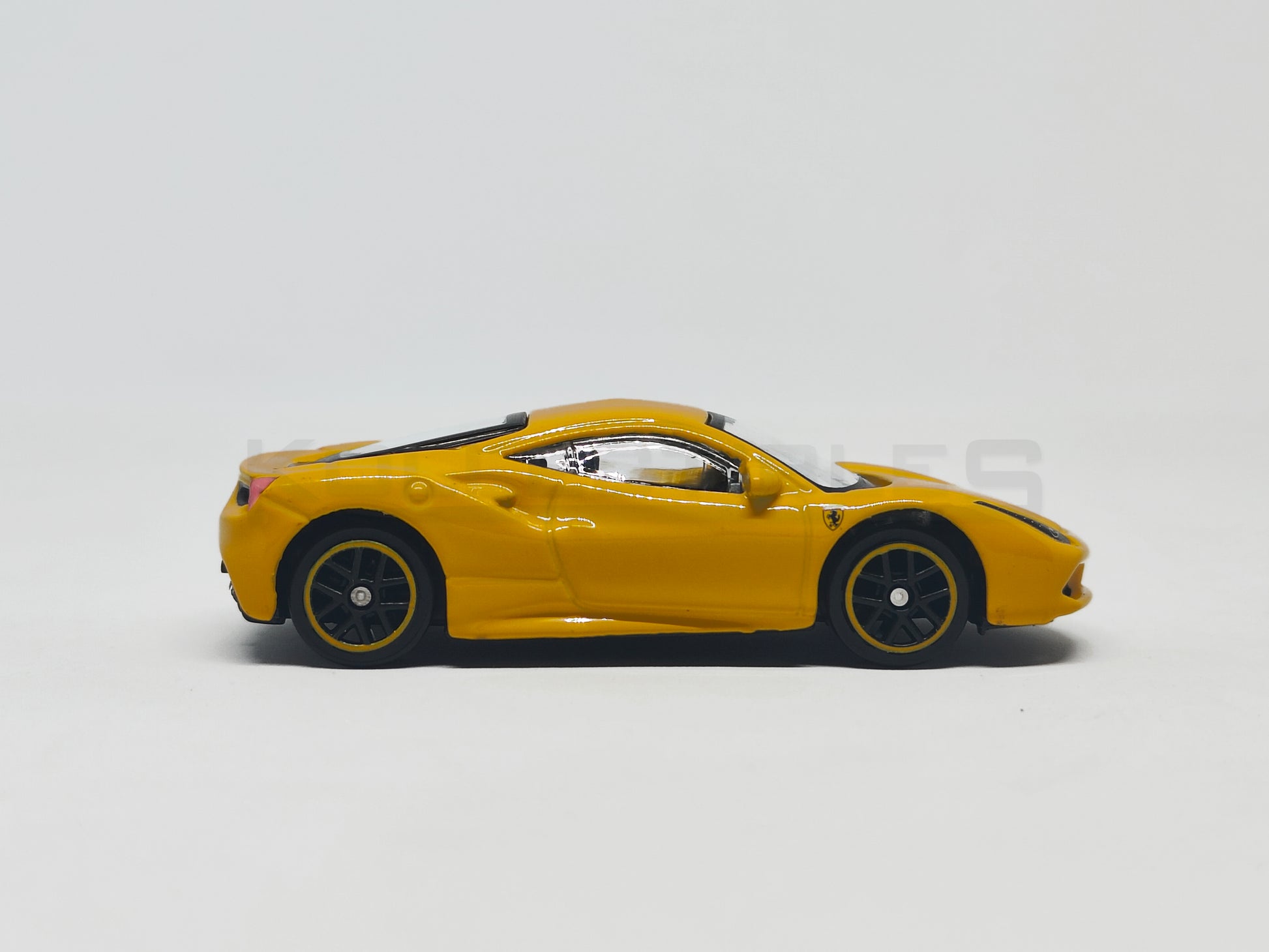 Side 2 view Ferrari 488GTB Yellow 1:64 Scale model car - Bburago