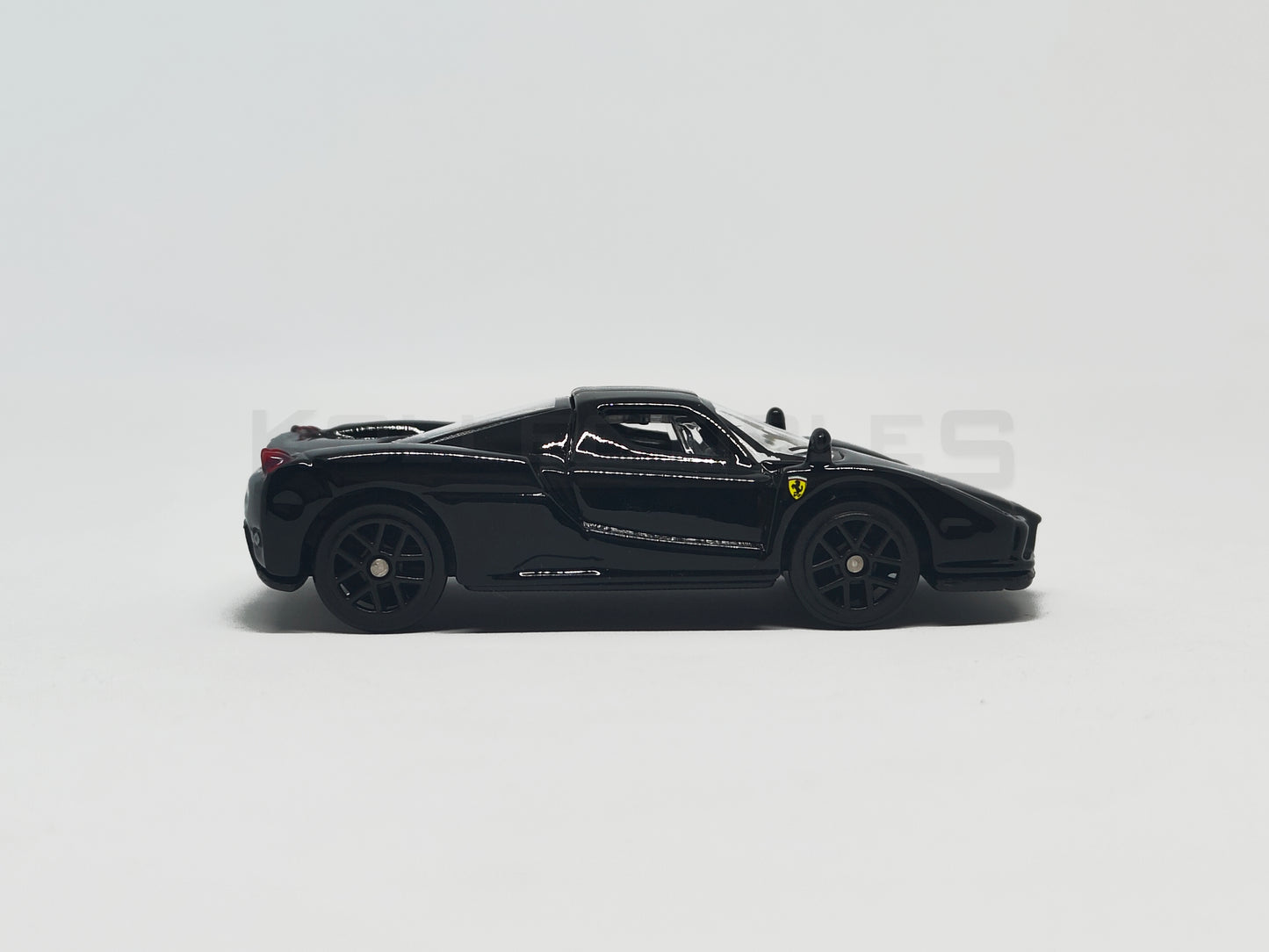 Enzo Ferrari Black 1:64 scale model car - Bburago