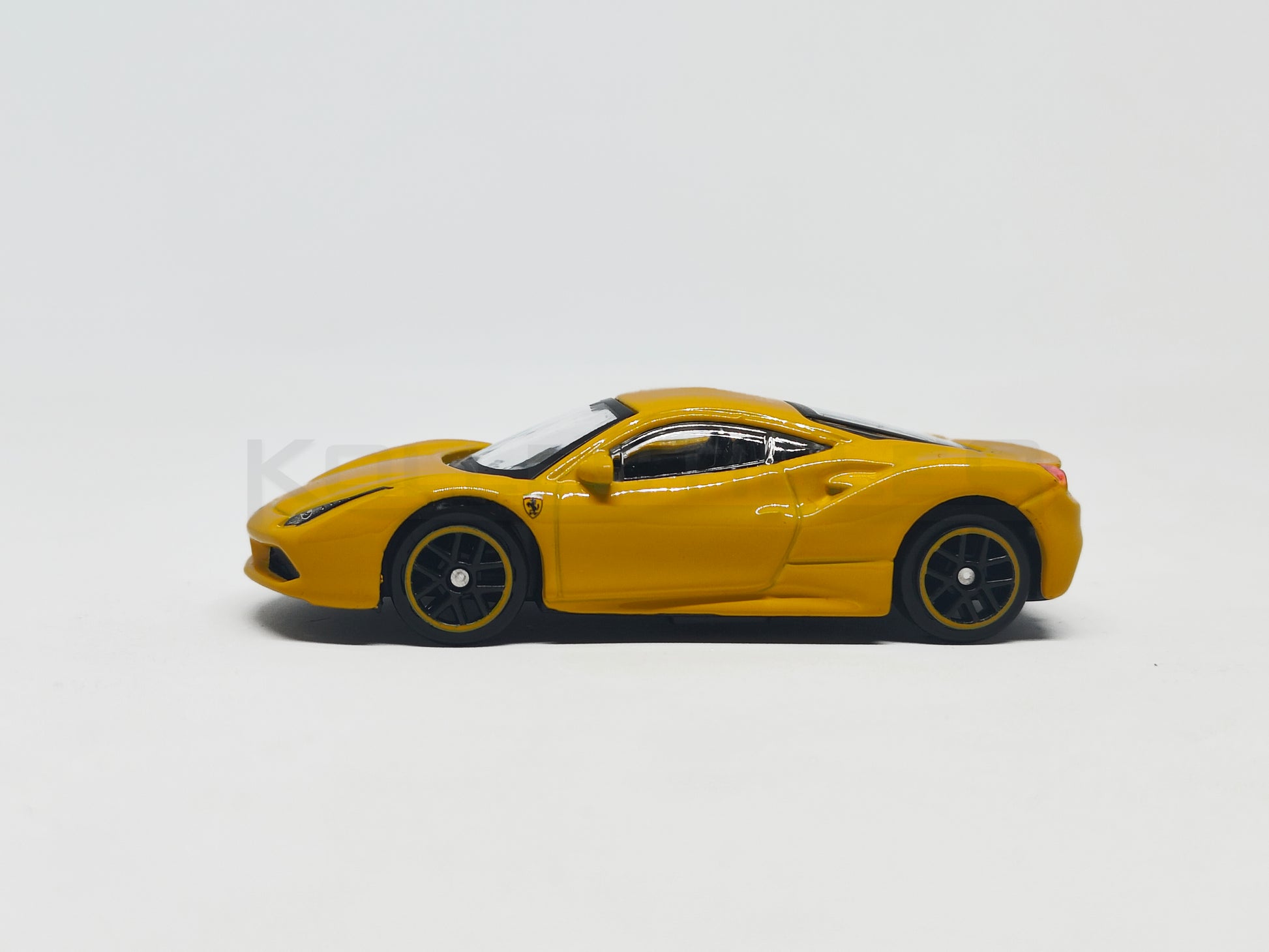 side1 Ferrari 488GTB Yellow 1:64 Scale model car - Bburago