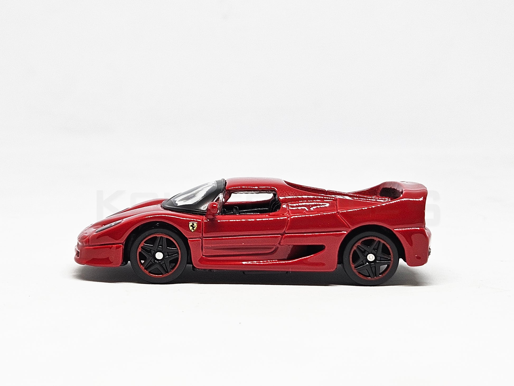 Side2 view of Ferrari F50 Red 1:64 scale model car - Bburago