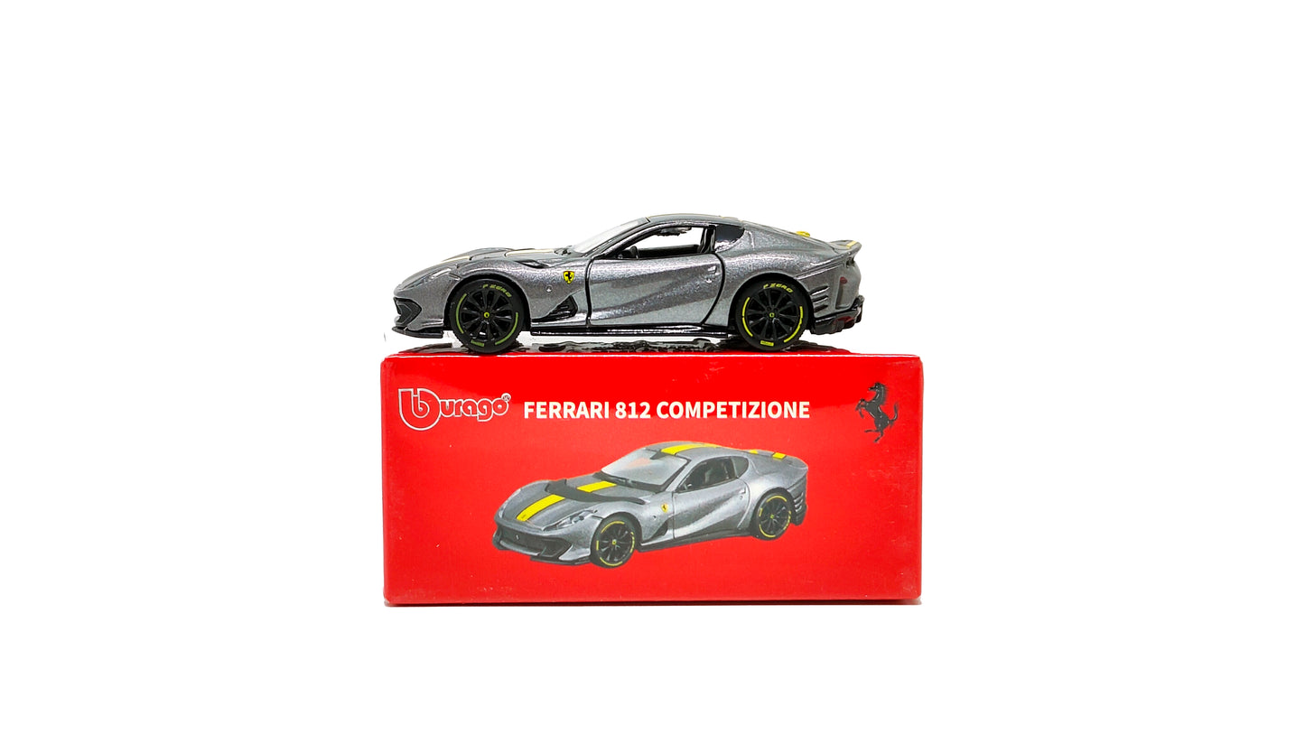 Ferrari 612 Competizione model car on a red box with Bburago logo